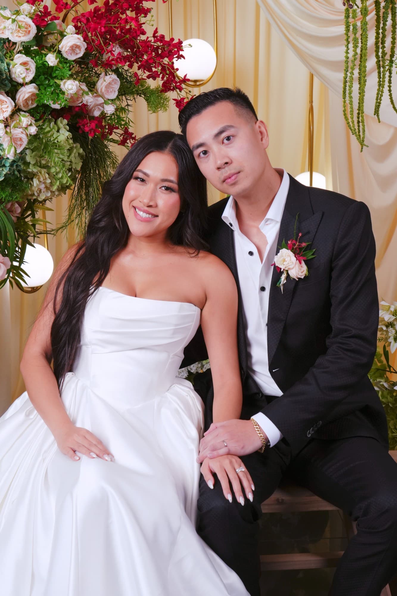 Bride and groom photographed at a wedding portrait station in Orange County