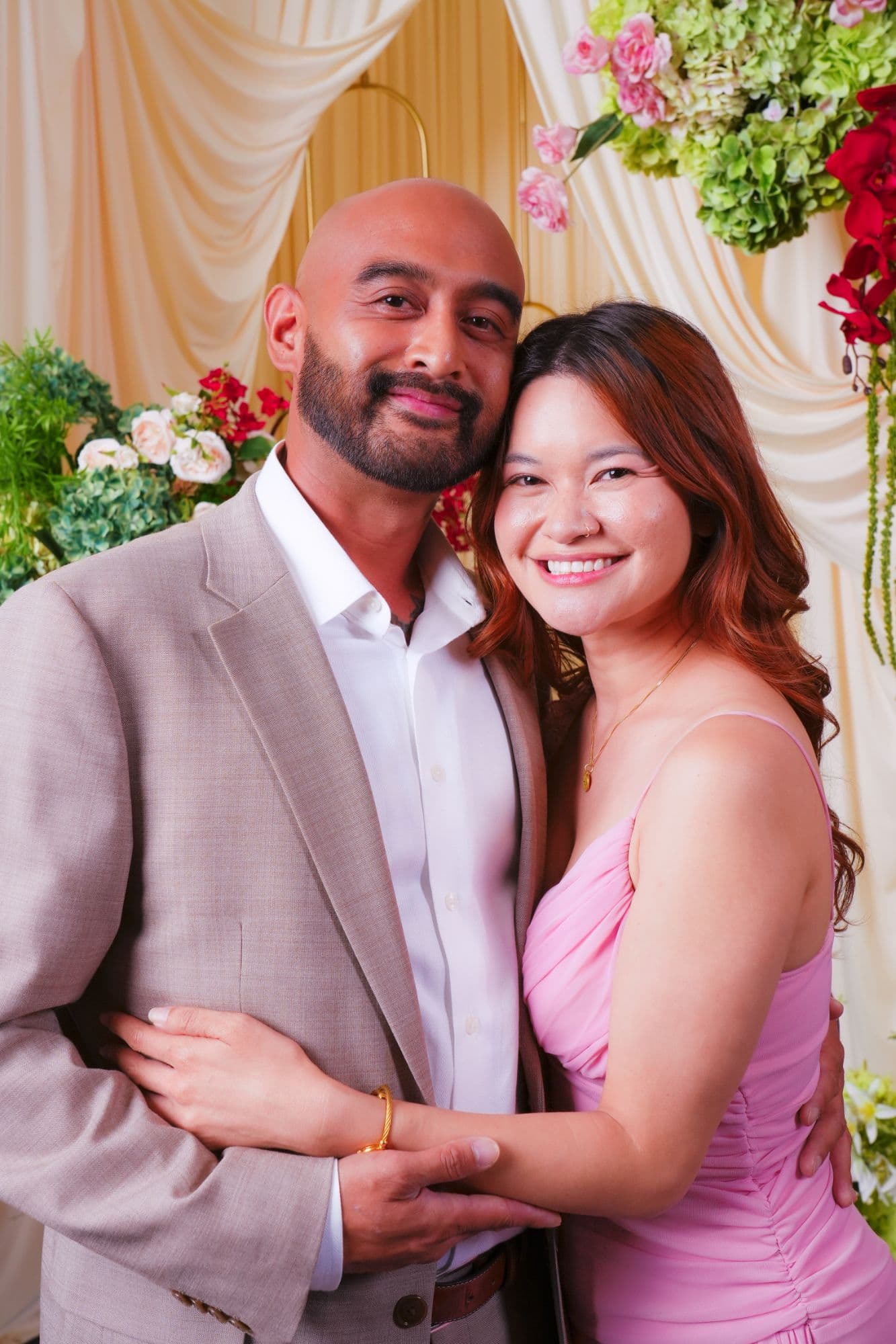 A couple photographed at a Temecula wine country wedding portrait station